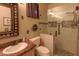 Modern bathroom featuring a glass enclosed shower and a vanity with a white sink at 2740 Carolina Blue Ave, Henderson, NV 89052
