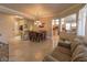 Open-concept living room and dining room provides seamless flow and abundant natural light at 2740 Carolina Blue Ave, Henderson, NV 89052