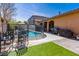 Backyard with a fenced pool and patio area, ideal for outdoor entertainment at 2740 Carolina Blue Ave, Henderson, NV 89052