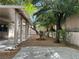 Relaxing backyard with trees and covered patio at 2855 Grande Valley Dr, Las Vegas, NV 89135