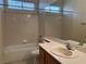Clean bathroom with tub, shower, and a well-lit vanity at 2855 Grande Valley Dr, Las Vegas, NV 89135