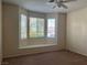 Bedroom featuring a large window seat and neutral carpet at 2855 Grande Valley Dr, Las Vegas, NV 89135