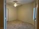 Bedroom with ceiling fan, tiled flooring, and direct access to outdoor patio at 2855 Grande Valley Dr, Las Vegas, NV 89135