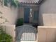 Inviting front entryway with a secure gated entry at 2855 Grande Valley Dr, Las Vegas, NV 89135