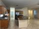 Spacious kitchen featuring granite countertops, wooden cabinets, and modern stainless steel appliances, open concept layout at 2855 Grande Valley Dr, Las Vegas, NV 89135