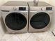 Modern laundry room showcasing a side-by-side Samsung washer and dryer at 2855 Grande Valley Dr, Las Vegas, NV 89135