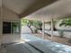 Covered patio with a view of the meticulously landscaped backyard at 2855 Grande Valley Dr, Las Vegas, NV 89135
