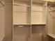 Organized walk-in closet with built-in shelving and ample storage space at 2855 Grande Valley Dr, Las Vegas, NV 89135