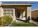 Back patio with lots of natural light and space for outdoor seating and relaxation at 325 Wild Plum Ln, Las Vegas, NV 89107