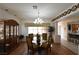 Inviting dining room with chandelier and built in cabinet for storage at 325 Wild Plum Ln, Las Vegas, NV 89107