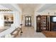 Open foyer showcases tile floors and access to the living room, kitchen, and bedroom areas at 325 Wild Plum Ln, Las Vegas, NV 89107