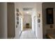 Hallway with tiled floors, neutral walls, and bright lighting at 325 Wild Plum Ln, Las Vegas, NV 89107