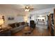 Comfortable living room features an inviting sofa and stylish ceiling fan at 325 Wild Plum Ln, Las Vegas, NV 89107