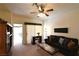 Inviting living room with a ceiling fan, comfortable seating, and sliding glass doors at 325 Wild Plum Ln, Las Vegas, NV 89107