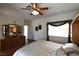Bright main bedroom featuring hardwood floors at 325 Wild Plum Ln, Las Vegas, NV 89107