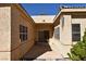 Exterior view of a covered patio and exterior walls at 325 Wild Plum Ln, Las Vegas, NV 89107