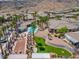Aerial view of neighborhood community including putting green, shuffle board and community pool at 3342 Pheasant Canyon Way # 1013, Laughlin, NV 89029