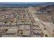 Expansive aerial view of a meticulously planned community, nestled amidst desert and lake landscapes at 3342 Pheasant Canyon Way # 1013, Laughlin, NV 89029