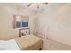 Bedroom features neutral walls, carpet, and a window for natural light at 3342 Pheasant Canyon Way # 1013, Laughlin, NV 89029