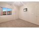 Bright bedroom featuring carpet flooring, and a window at 3342 Pheasant Canyon Way # 1013, Laughlin, NV 89029