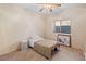 Cozy bedroom with carpet flooring, a window, and a ceiling fan at 3342 Pheasant Canyon Way # 1013, Laughlin, NV 89029