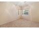 Empty bedroom with carpet, natural light and neutral wall paint at 3342 Pheasant Canyon Way # 1013, Laughlin, NV 89029