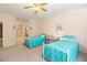 Spacious carpeted bedroom with twin beds, closet, and adjacent bathroom at 3342 Pheasant Canyon Way # 1013, Laughlin, NV 89029