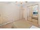 Bright bedroom with mirrored closet doors and carpeted floor at 3342 Pheasant Canyon Way # 1013, Laughlin, NV 89029