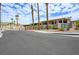 Quail Ridge entrance gate showcasing desert landscaping and community signage against a sunny sky at 3342 Pheasant Canyon Way # 1013, Laughlin, NV 89029