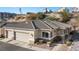 Charming single-story home with a two-car garage and desert landscaping at 3342 Pheasant Canyon Way # 1013, Laughlin, NV 89029