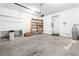 The bright and spacious two-car garage features an exterior door and water filtration system at 3342 Pheasant Canyon Way # 1013, Laughlin, NV 89029