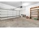 A two car garage is ready to be used with plenty of shelving for extra storage at 3342 Pheasant Canyon Way # 1013, Laughlin, NV 89029