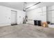 The two car garage features a door to the exterior and water equipment at 3342 Pheasant Canyon Way # 1013, Laughlin, NV 89029