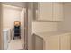 Laundry room with cabinetry and washer/dryer hookups at 3342 Pheasant Canyon Way # 1013, Laughlin, NV 89029