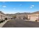 Street view of well-maintained homes with mountain views at 3342 Pheasant Canyon Way # 1013, Laughlin, NV 89029