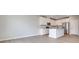 Modern kitchen featuring stainless steel appliances, quartz countertops, and a central island at 3357 Via Tizzoni St, Henderson, NV 89044