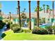 Inviting pool area with palm trees and lush landscaping at 3550 Bay Sands Dr # 3051, Laughlin, NV 89029