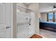 Bathroom with glass-enclosed shower and adjacent main bedroom at 3556 Valley Lily St, North Las Vegas, NV 89032