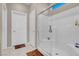 Tiled bathroom features a large shower, and neutral flooring at 3556 Valley Lily St, North Las Vegas, NV 89032