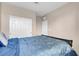 Cozy bedroom featuring closet space and comfortable furnishings at 3556 Valley Lily St, North Las Vegas, NV 89032