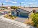 Charming single-story home with a well-manicured front yard and a two car garage at 3556 Valley Lily St, North Las Vegas, NV 89032