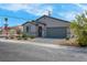 Charming single-story home with a well-manicured front yard and inviting curb appeal at 3556 Valley Lily St, North Las Vegas, NV 89032