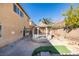 Rear exterior view of backyard with gazebo and partial view of the home's rear elevation at 3774 Dusky Flycatcher St, Las Vegas, NV 89122