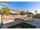 Backyard featuring a quaint gazebo sitting on a landscaped lot with a brick perimeter and block wall at 3774 Dusky Flycatcher St, Las Vegas, NV 89122