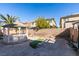 The backyard with a gazebo with block wall in the background at 3774 Dusky Flycatcher St, Las Vegas, NV 89122
