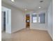 Inviting dining area featuring arched openings and view into the kitchen at 3774 Dusky Flycatcher St, Las Vegas, NV 89122
