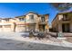 Charming two-story home featuring a three-car garage and desert landscaping at 3774 Dusky Flycatcher St, Las Vegas, NV 89122