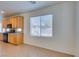Bright kitchen with stainless appliances and tile flooring at 3774 Dusky Flycatcher St, Las Vegas, NV 89122
