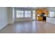 Open-concept living area features tile floors, natural light, and flows into the kitchen and outdoor space at 3774 Dusky Flycatcher St, Las Vegas, NV 89122
