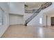 Open living space with a staircase, high ceilings, and lots of light at 3774 Dusky Flycatcher St, Las Vegas, NV 89122